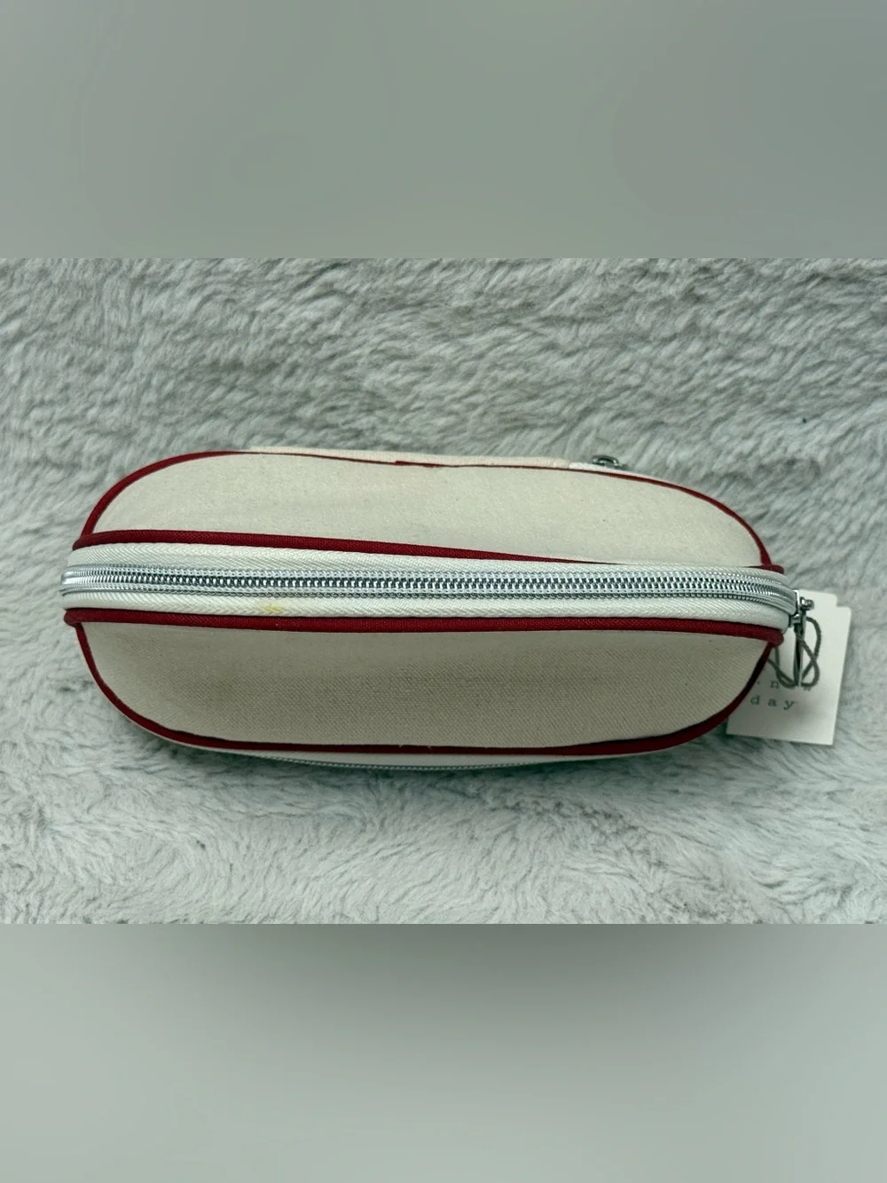 a new day Cream Cosmetic Pouch with Red Trim